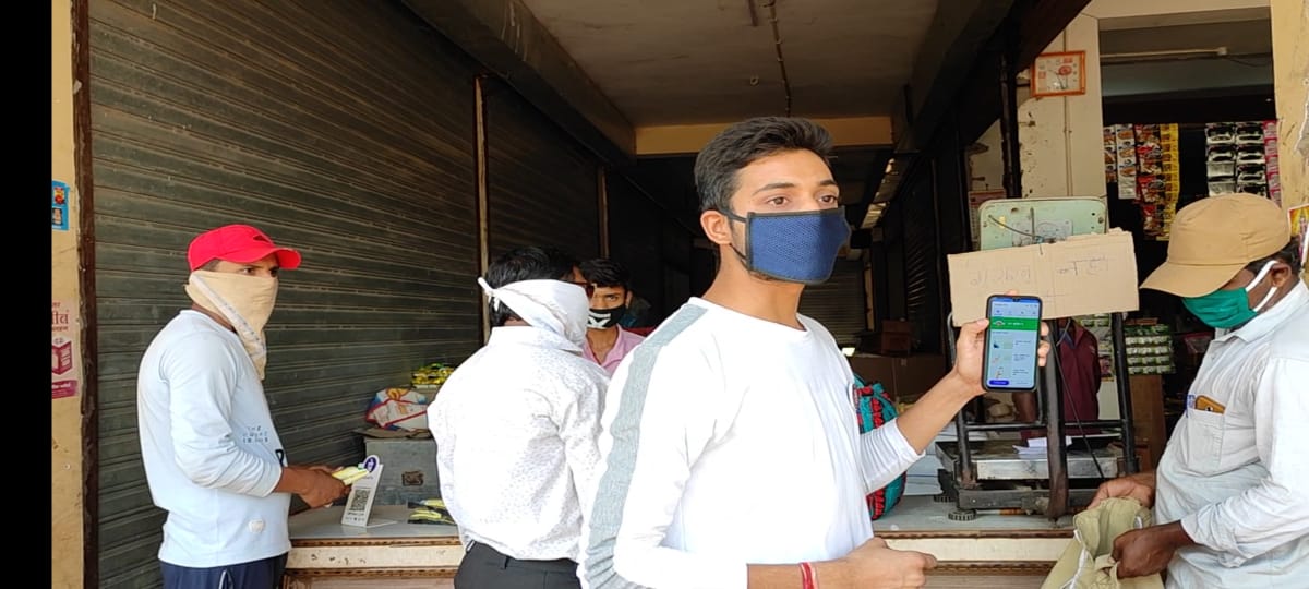 NSS/कोरोना काल मे अर्जुन्दा के बाजार चौक में आरोग्य सेतु एप्प की जानकारी व उपयोग का प्रचार-प्रचार -Shahid Durwasa Nishad Government College Arjunda District Balod, C.G.